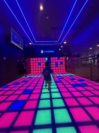 Players dodging the red tiles